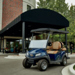 Blue Tempo Golf Car Parked in Front of Building